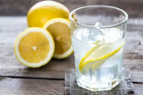 Hydration: The Secret Ingredient for a Toned Stomach and Enhanced Fitness 2 Image of lemon water to aid hydration Kent